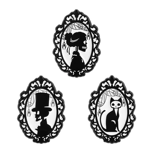 Set of 3 vintage gothic brooch pins featuring skeleton silhouette portraits in oval frames
