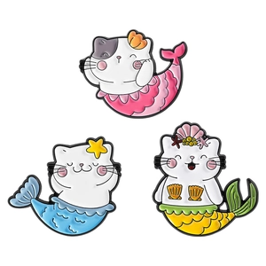 Trois pin's mignons chat sirène en émail rose, bleu et jaune avec des finitions en alliage