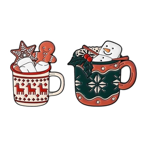 Festive Christmas enamel pins featuring snowman and reindeer mugs with gingerbread man
