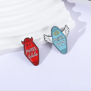 Gothic Angel and Devil Motel enamel pins with 666 and 444 wings designs