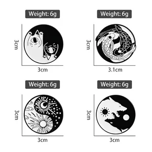Set of four yin yang enamel pins featuring cats, koi fish, celestial clouds, and wolf motifs