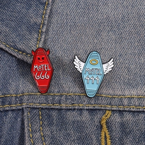 Creative motel badges featuring angel and devil coffin designs on denim jacket fabric
