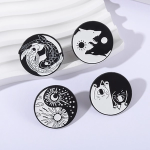 Yin Yang Tai Chi enamel pins featuring koi fish, wolf, moon sun, and cat themes