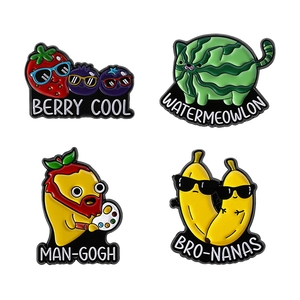 Set of 4 creative fruit enamel pins featuring puns like Berry Cool and Watermeowlon