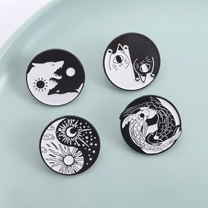 Creative black and white enamel pin set featuring yin yang wolf, cat, and koi fish designs