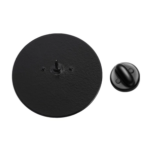 Detailed macro view of black metal pin back clutch and base for enamel lapel badges