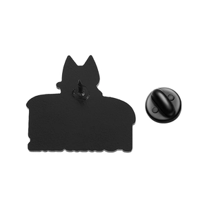 Detail view of the matte black metal enamel pin back with a secure clutch fastening