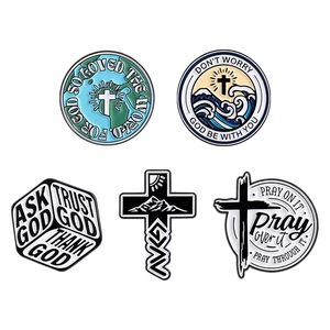 Set of five metal enamel cross pins with religious motifs and natural landscape designs