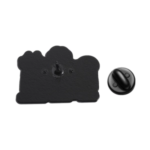 Macro shot of the black matte metal brooch back with secure rubber clutch backing