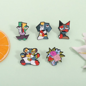Cubist enamel pins set featuring artistic animal and floral designs on green background