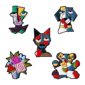 Artistic cubist metal brooches with geometric animal and floral designs in vibrant colors