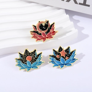 Enamel lotus brooch set featuring sun moon and star motifs with vibrant cosmic patterns