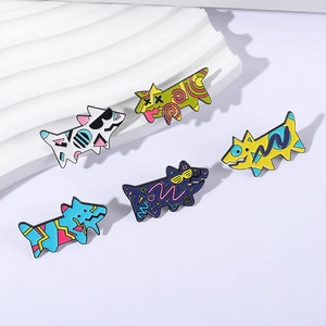 Vintage pop art dog brooches with colorful geometric patterns in a 5-piece enamel set