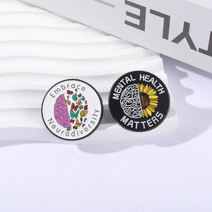 Set of two neurodiversity enamel pins with sunflower brain and mental health slogans