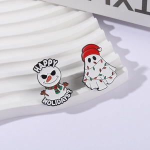 Enamel snowman and festive ghost pins set with Christmas lights and dark holiday style