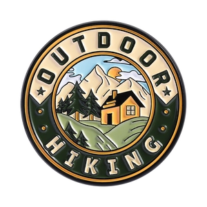 Hiking and outdoor themed enamel pin with mountain scenery and forest cabin design