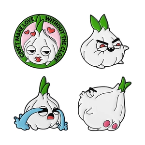 Set of four cute cartoon garlic enamel pins with funny expressions and puns on white background