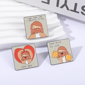 Set of 3 square enamel pins with Jesus motifs and inspirational quotes on a white stand