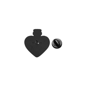 Close-up of the gothic black cat magic bottle pin back with heart-shaped metal base