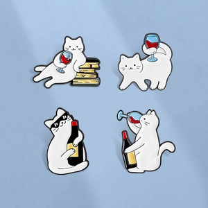 Funny white cat enamel pins set featuring 4 creative designs with red wine and books