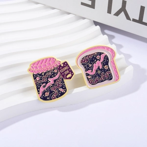 Cosmic Jam and Toast enamel pin set with purple glitter stars and galaxy design