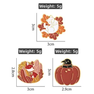 Detailed specs of autumn enamel pins featuring fox, cat, and crow with pumpkin designs