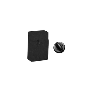 Detail of the matte black metal brooch backplate and secure rubber clutch pin closure