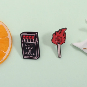 Gothic Hell Matchstick Enamel Pins featuring skull fire elements for jackets and backpacks