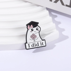 Cute ghost enamel pin with graduation cap and flowers featuring I Did It text badge