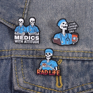 Funny medical enamel pins set with skeleton medics and humorous quotes on denim