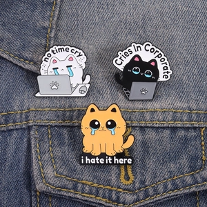 Funny corporate cat enamel pins with emo slogans on dark denim background set