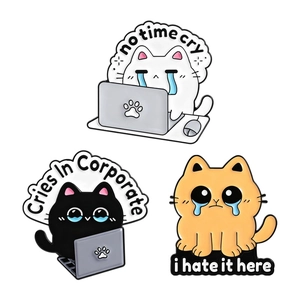 Set of three funny corporate cat enamel pins with humorous office quotes and laptops