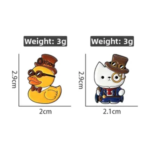 Steampunk enamel pins featuring duck and cat characters with vintage top hats and goggles
