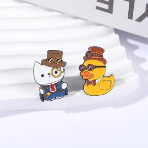 Steampunk style metal enamel brooch set featuring a cartoon white cat and yellow duck