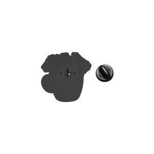 Detail view of the black matte enamel pin back featuring a metal needle and rubber clutch