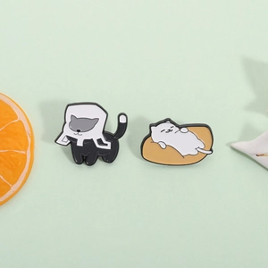 Cute black and white cat alloy enamel brooches set on a soft green background decoration
