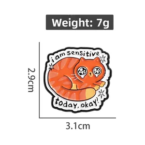Vue détaillée du pin's chat orange mignon avec dimensions de 3,1 cm x 2,9 cm