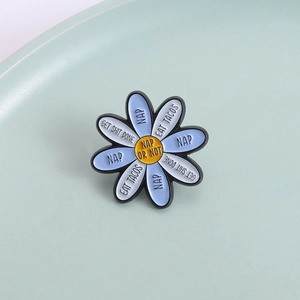 Creative light blue and white daisy enamel pin with a yellow center and funny texts