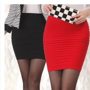 Detail view of high-waist layered pleated mini skirt in black and vibrant red colors