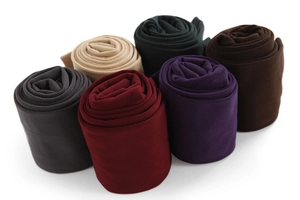 Detail view of winter thermal leggings in six colors showing soft brushed fabric texture