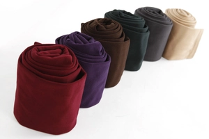 Detail view of winter leggings showing six classic colors in soft brushed fleece fabric