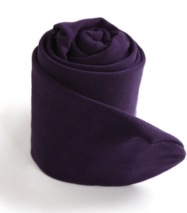 Detail shot of purple elastic thermal leggings showing the soft knit texture and fabric