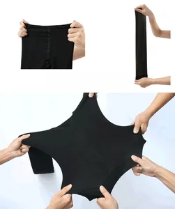 Detail showing high elasticity and stretch strength of black thermal leggings