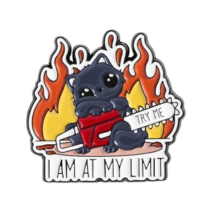 Cartoon black cat enamel pin with chainsaw and flame design featuring I Am At My Limit slogan