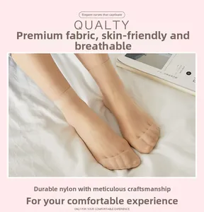 Detail of sheer nude ankle socks with reinforced toe design and breathable nylon fabric