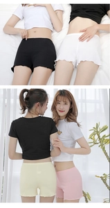 Detail showing wavy lettuce edge hem on high waist safety shorts in multiple pastel colors