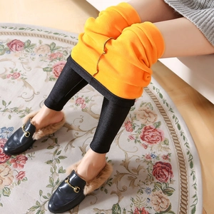 Leggings neri lucidi da donna con spessa fodera in pile arancione invernale