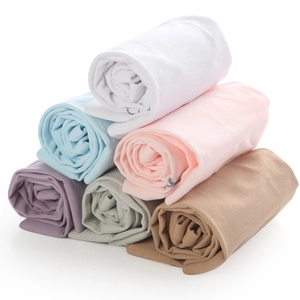 Ice silk sun protection cooling sleeves in pastel colors stacked for outdoor use