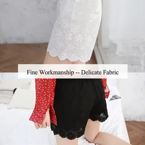 Women's cotton safety shorts with floral lace trim in black and white colors