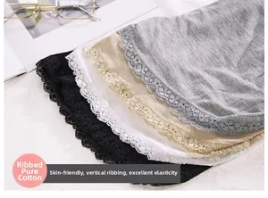 Detail of ribbed cotton fabric and floral lace trim on women's safety shorts